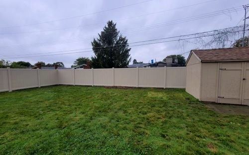 Almond PVC privacy fence